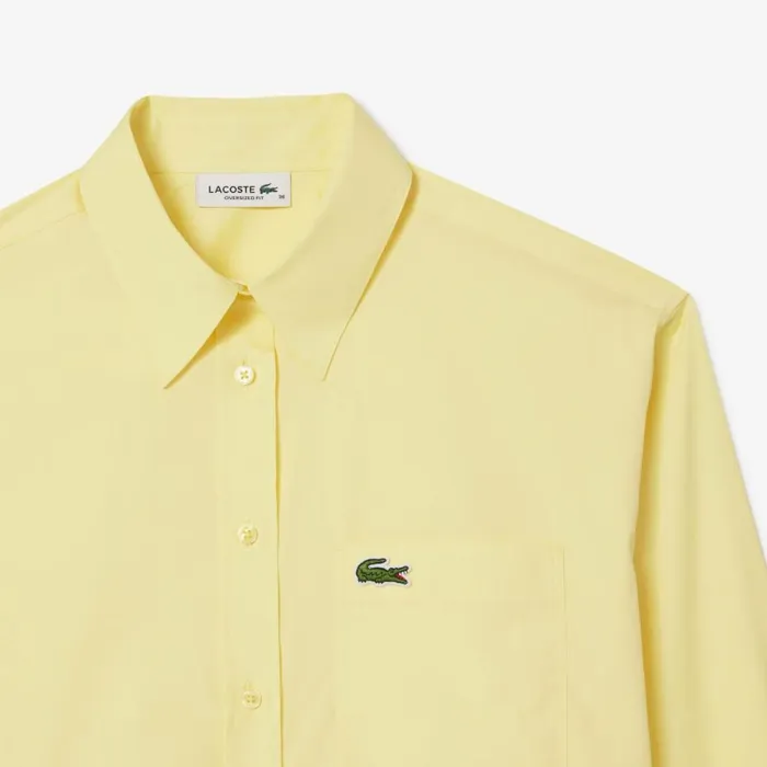 TShirts and Tops Women Lacoste Women039s Oversized Fit Cotton Poplin Shirt Pastel Yellow 107